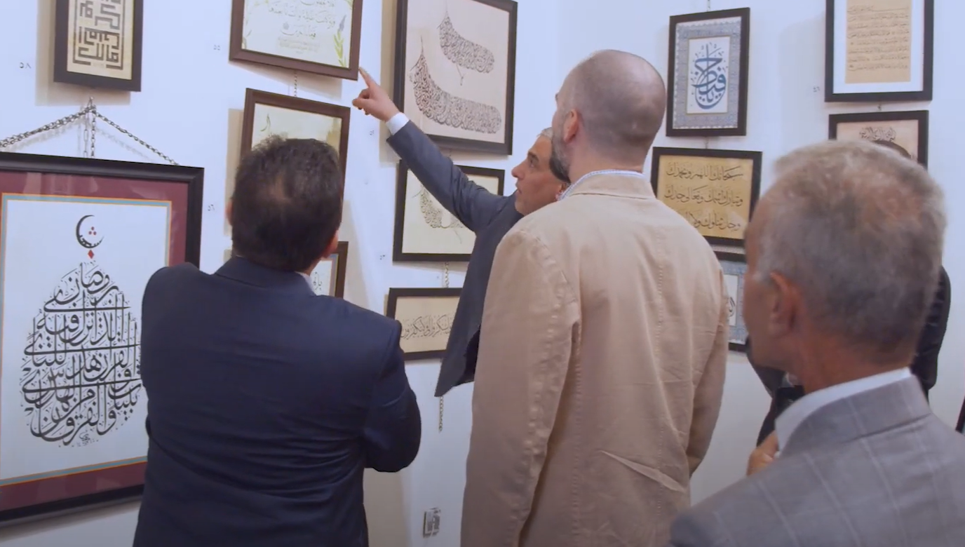 Visitors viewing student calligraphy exhibition