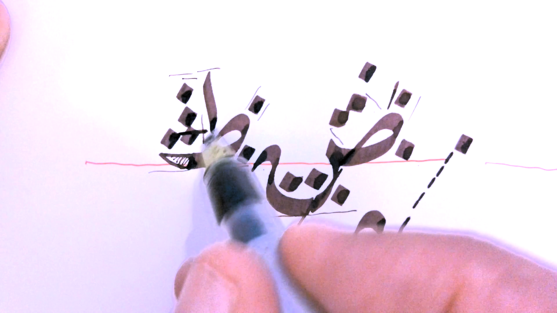 Close-up of calligraphy pen technique from video lesson